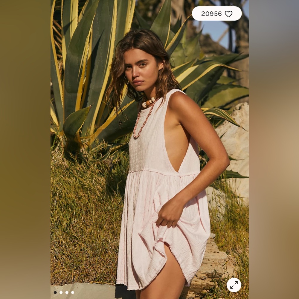 Free people I’m still obsessed sleevless mini dress.